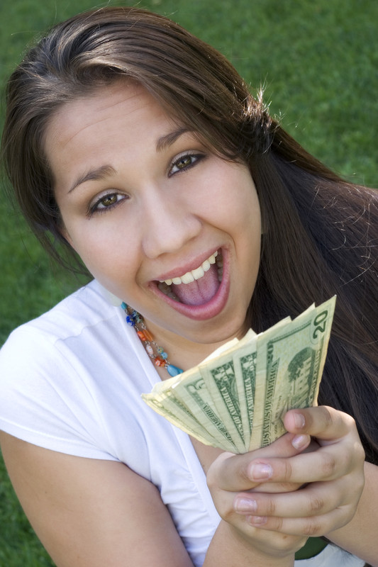 teen with cash