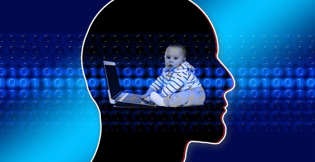 Baby on laptop - AshTutors.co.uk